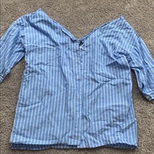 Quarter length sleeve off the shoulder shirt